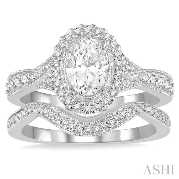 1 1/10 ctw Free Form Shank Round Cut Diamond Bridal Set With 1 ctw Oval Cut Engagement Ring and 1/10 ctw Curved Center Wedding Band in 14K White Gold