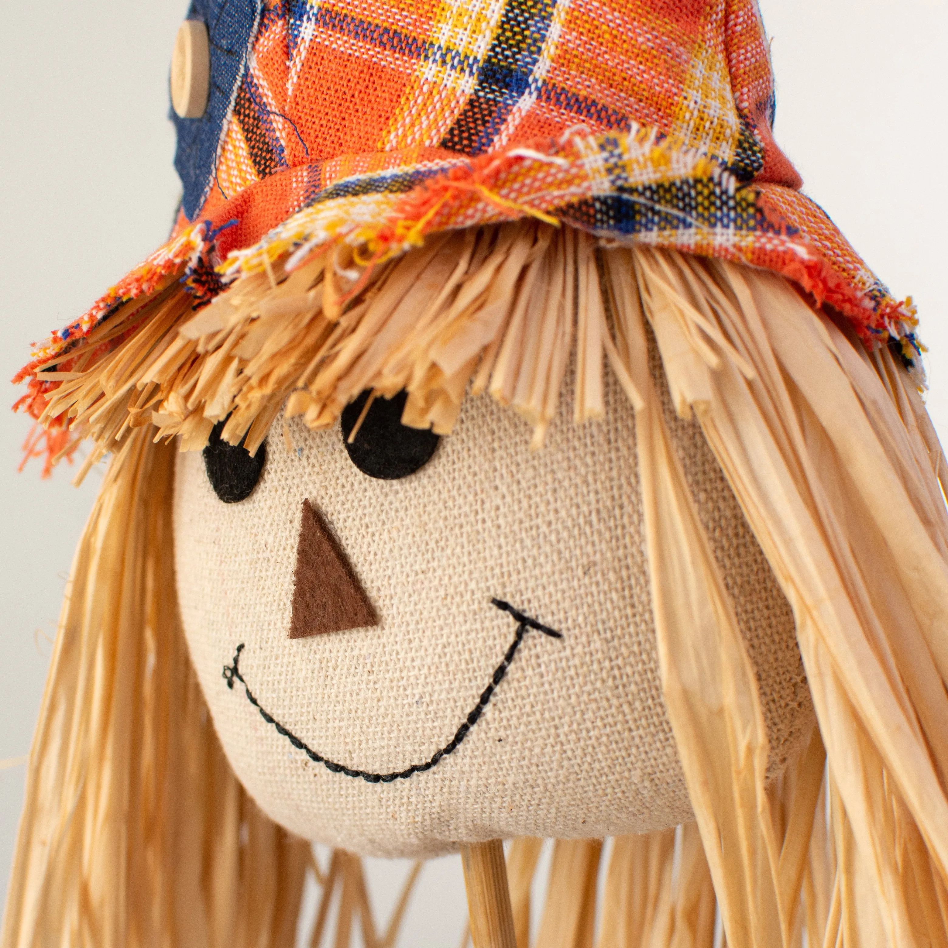 19.5" Fabric Scarecrow Head Pick: Orange & Yellow